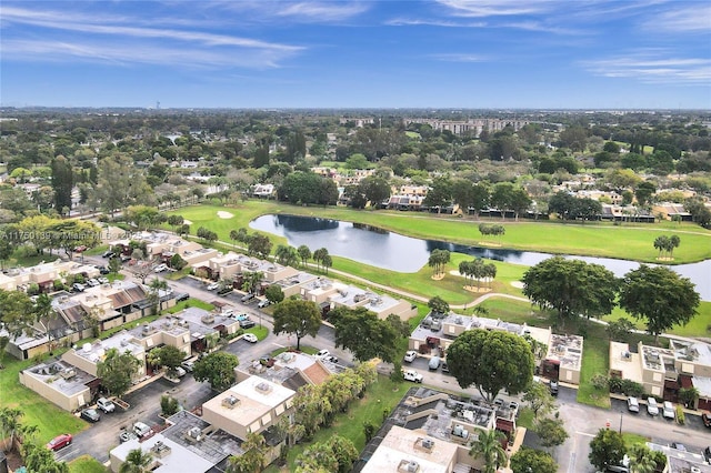 birds eye view of property with a residential view and a water view