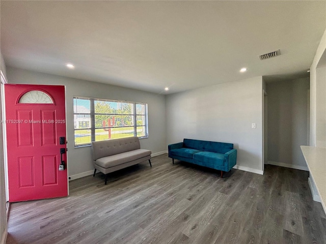 entryway featuring recessed lighting, wood finished floors, visible vents, and baseboards