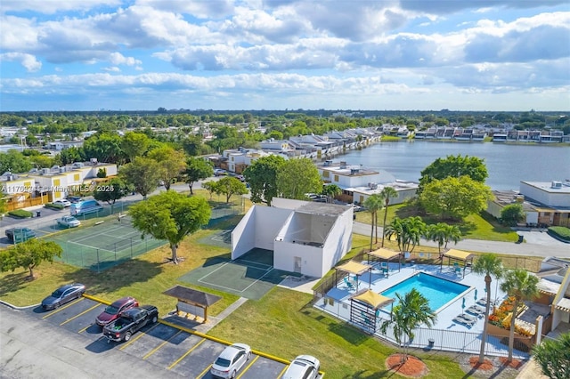 birds eye view of property featuring a water view