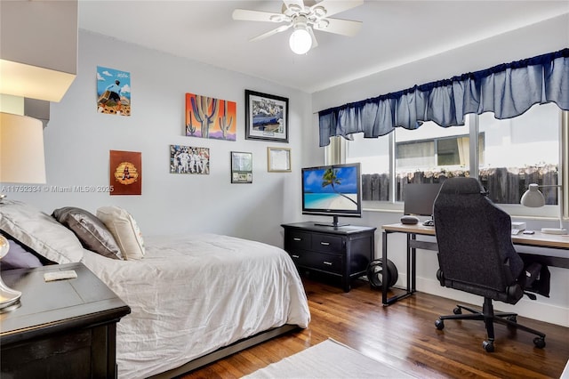 bedroom with a ceiling fan and wood finished floors