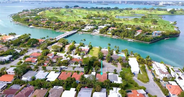 bird's eye view featuring a water view and a residential view