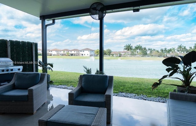 view of patio featuring a water view