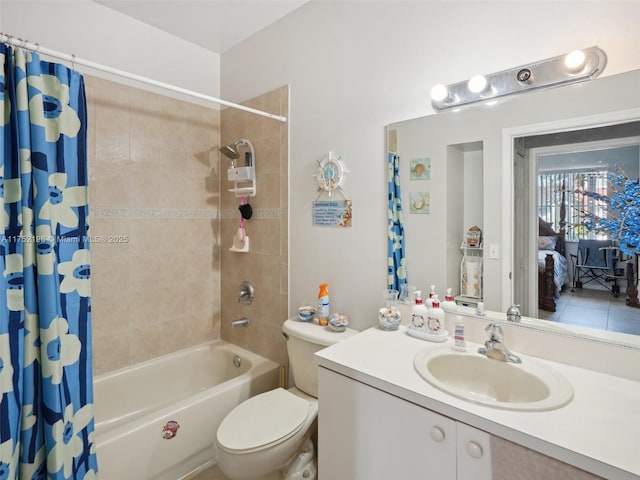 ensuite bathroom featuring shower / bath combo, ensuite bath, vanity, and toilet