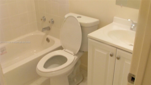 full bathroom featuring toilet and vanity