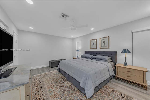 bedroom featuring ceiling fan, recessed lighting, visible vents, and light wood-style floors