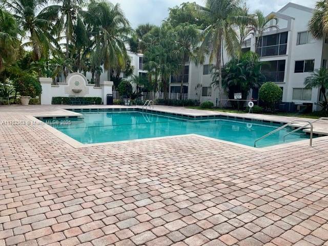 community pool with a patio