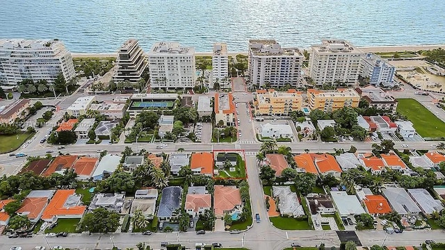 bird's eye view with a water view and a view of city