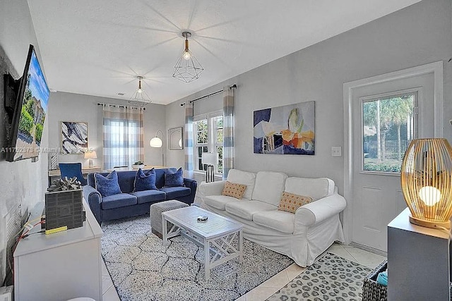 living area with light tile patterned flooring