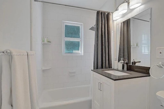 bathroom with toilet, shower / bath combo, and vanity