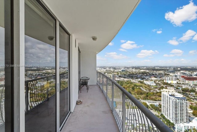 balcony featuring a city view