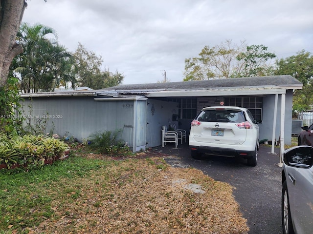6825 SW 12th St, Pembroke Pines, FL 33023 - view of side of property with roof with shingles