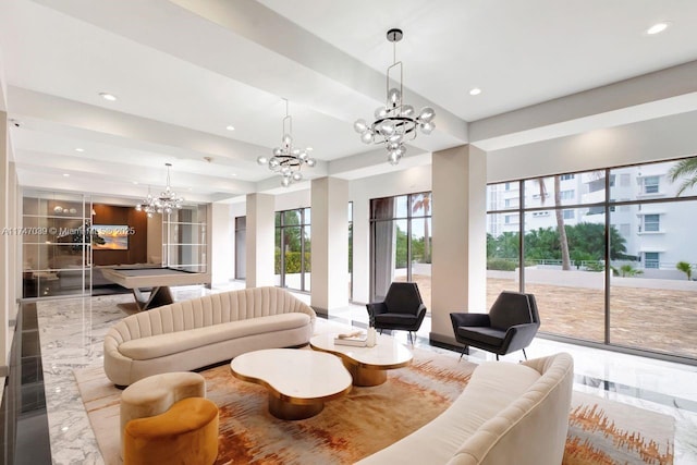 living room with marble finish floor, billiards, a chandelier, and recessed lighting