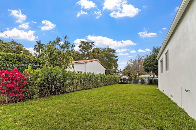 view of yard featuring fence