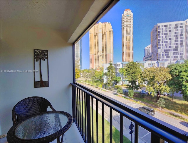 balcony featuring a city view