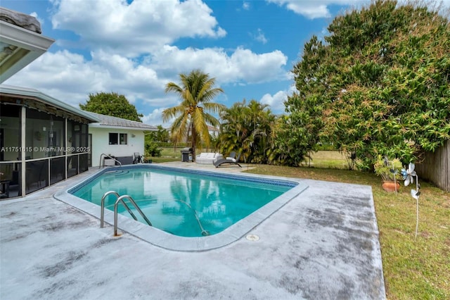 view of pool with a fenced in pool, a fenced backyard, a patio, and a lawn