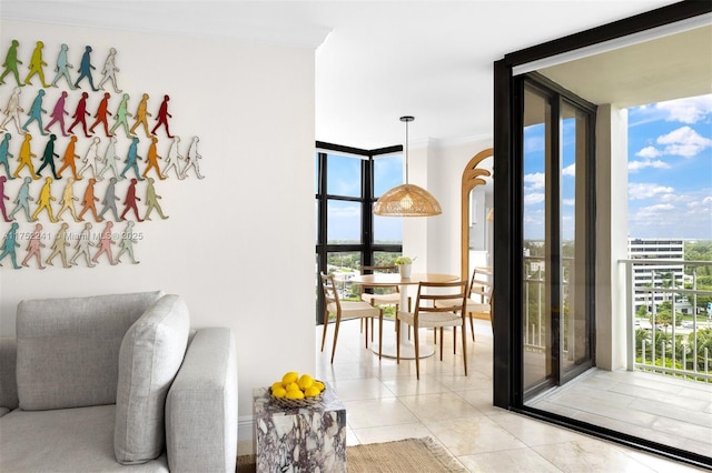 interior space with a wall of windows and light tile patterned floors