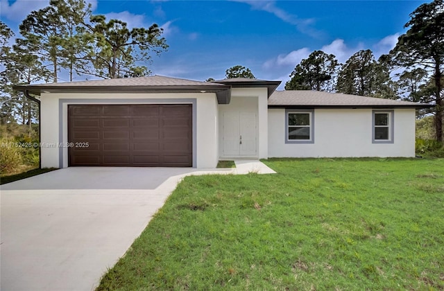 view of front of property featuring an attached garage, stucco siding, driveway, and a front yard