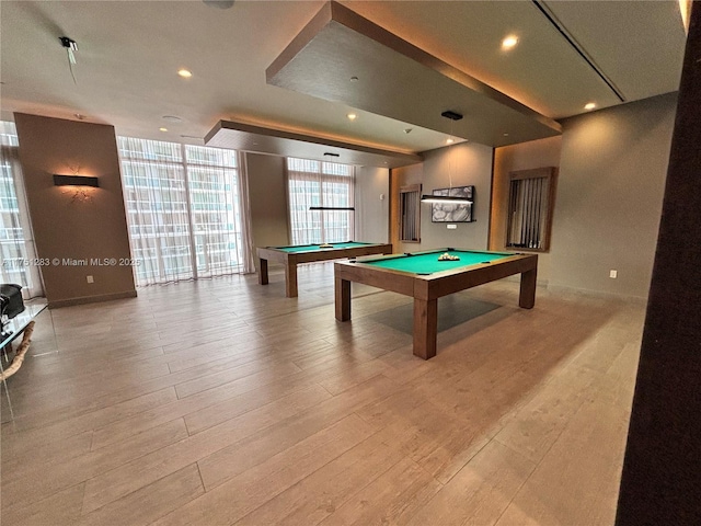 rec room with light wood-style floors, expansive windows, pool table, and recessed lighting