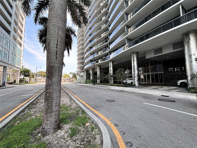 view of road featuring curbs and sidewalks