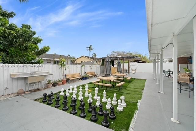 view of yard featuring a fenced backyard and a patio area