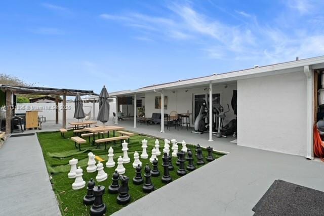 view of patio / terrace with fence