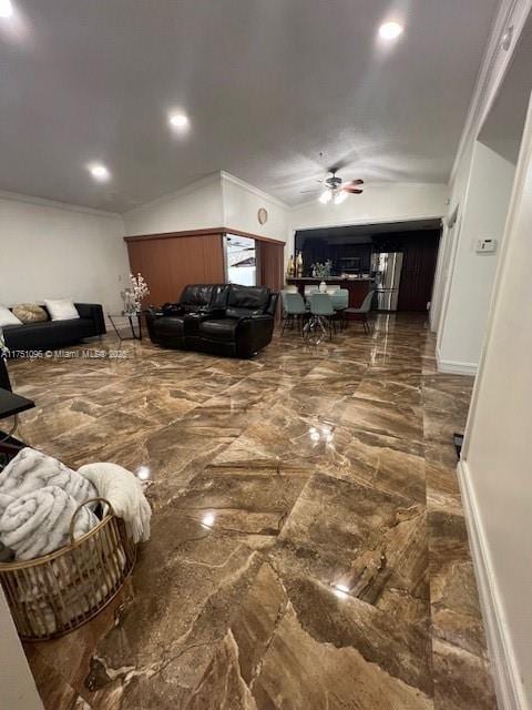 living area featuring ceiling fan, marble finish floor, and crown molding