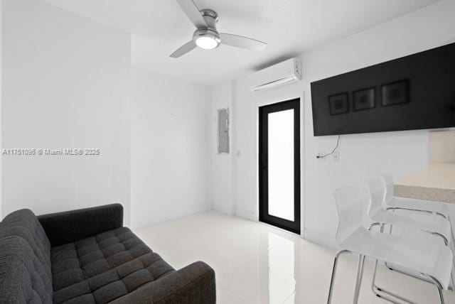 living area featuring ceiling fan, a wall mounted AC, and electric panel