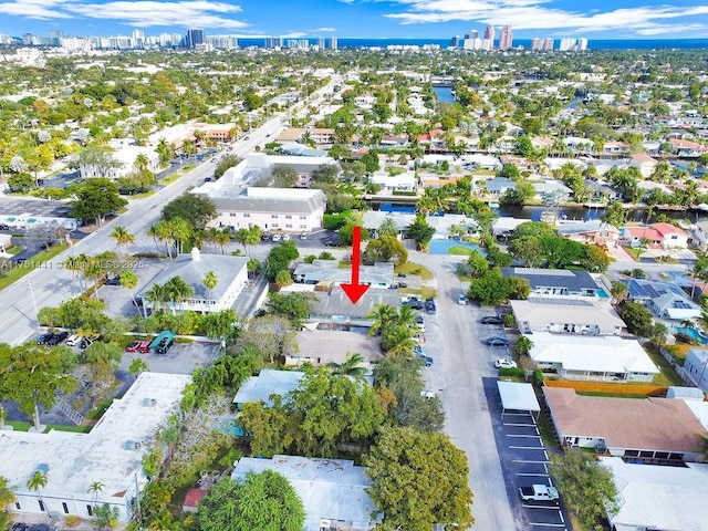 birds eye view of property with a city view