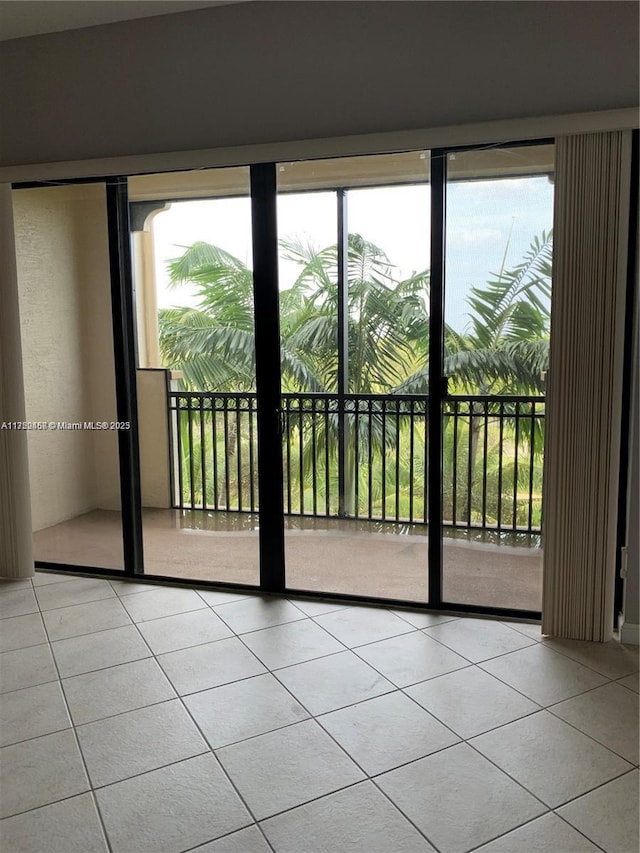 entryway featuring light tile patterned floors