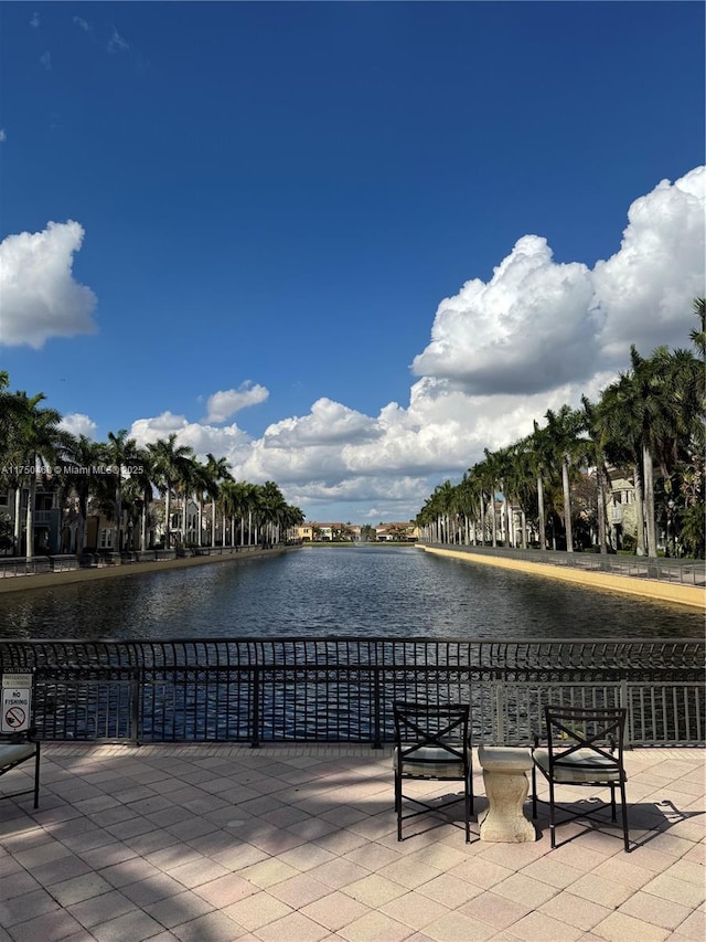 view of patio featuring a water view