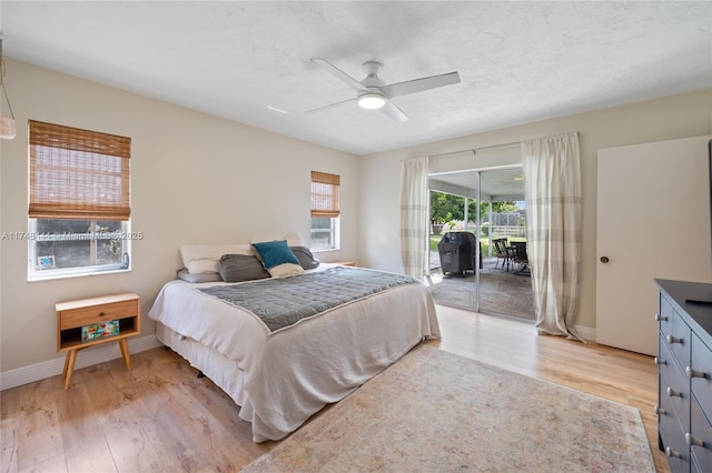 bedroom with a ceiling fan, access to outside, baseboards, and light wood finished floors