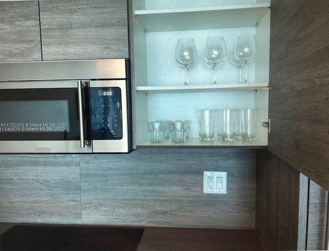 room details featuring stainless steel microwave