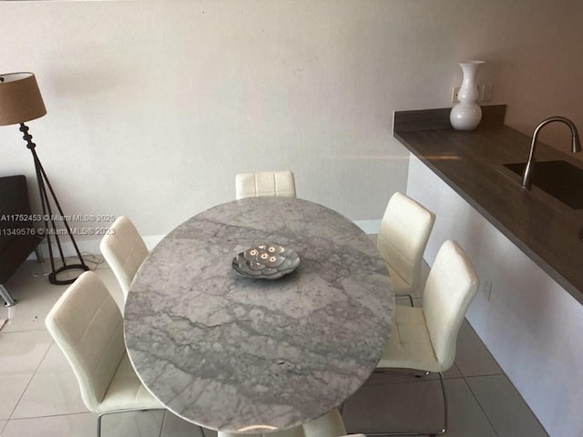 dining room with light tile patterned floors