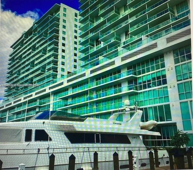 view of building exterior featuring fence