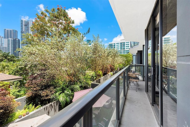 balcony featuring a view of city