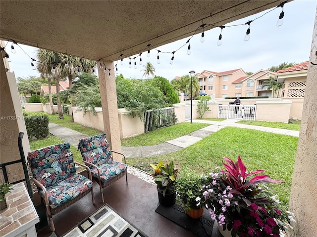 view of patio / terrace featuring fence