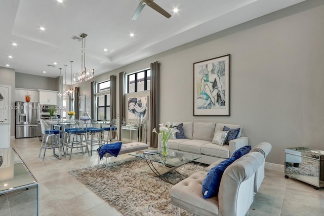 living area with ceiling fan, light tile patterned floors, recessed lighting, visible vents, and baseboards