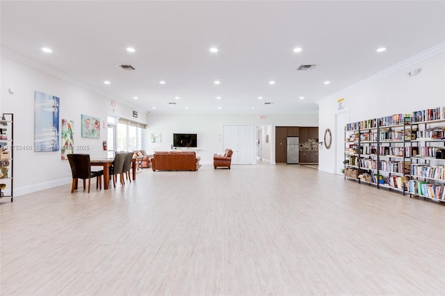 misc room with recessed lighting, visible vents, and crown molding