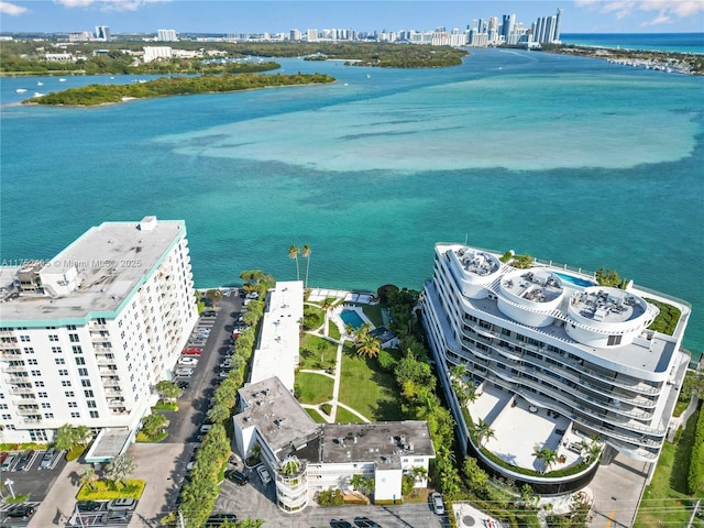 aerial view featuring a water view and a city view