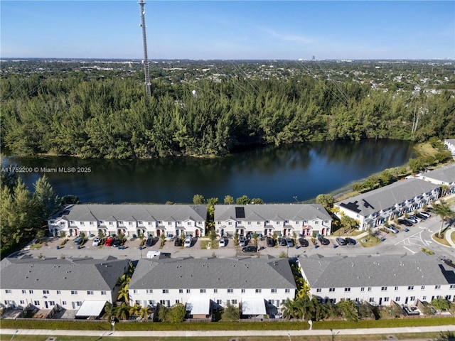 bird's eye view with a residential view and a water view