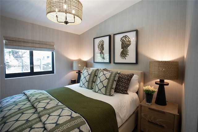 bedroom featuring lofted ceiling