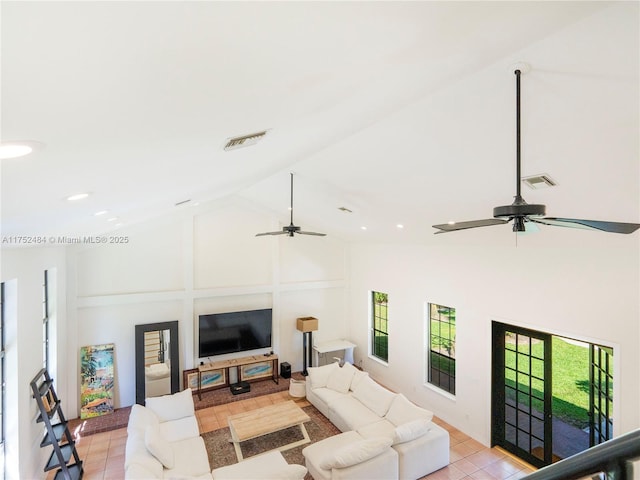 living room featuring high vaulted ceiling, visible vents, and a ceiling fan