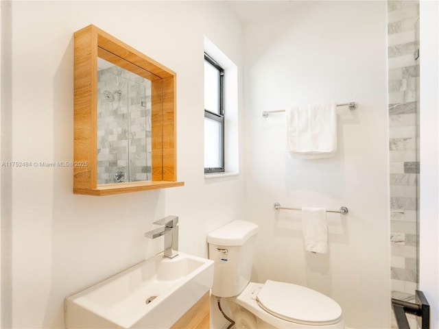 bathroom featuring a sink and toilet