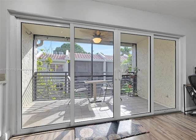 doorway to outside with wood finished floors