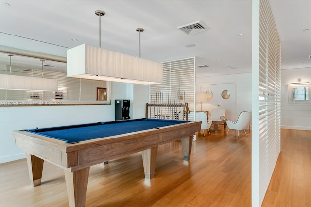 game room with visible vents, billiards, and light wood-style flooring