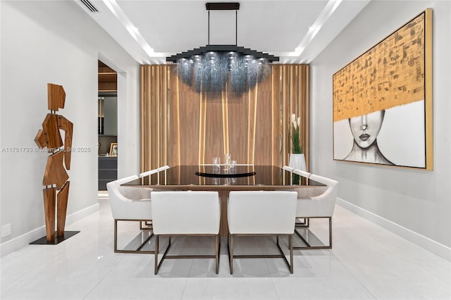 dining room with visible vents and baseboards