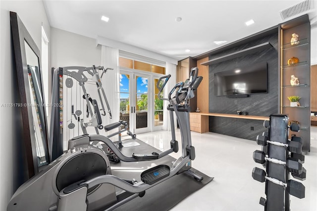 workout area featuring french doors and visible vents