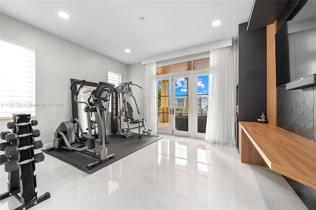 exercise room featuring recessed lighting, baseboards, and french doors