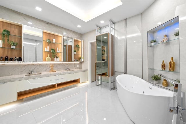 bathroom featuring a sink, a soaking tub, backsplash, a shower stall, and double vanity