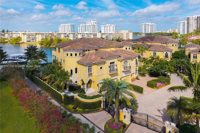 drone / aerial view with a water view and a city view